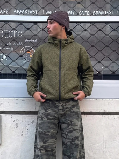 FAUVE | Veste de pluie léopard